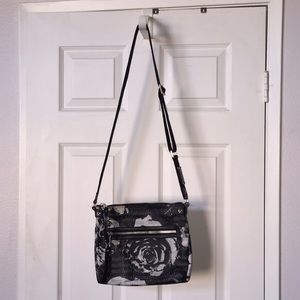 8.5” by 10” hand bag leather Lamb with silk lining